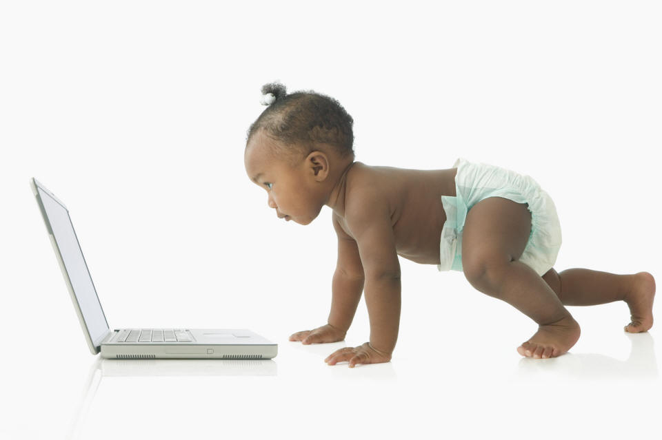 Baby or small child in front of a computer