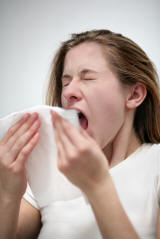 Women Sneezing