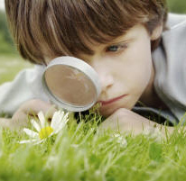 Boy with Magnifying Glass