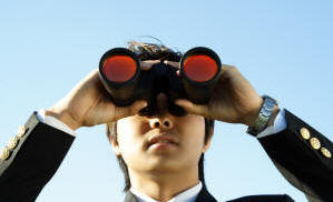 Man Searching with Binoculars