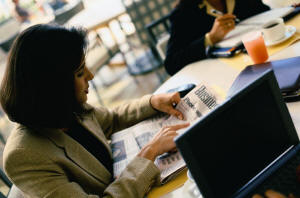 Women Reading a News Paper