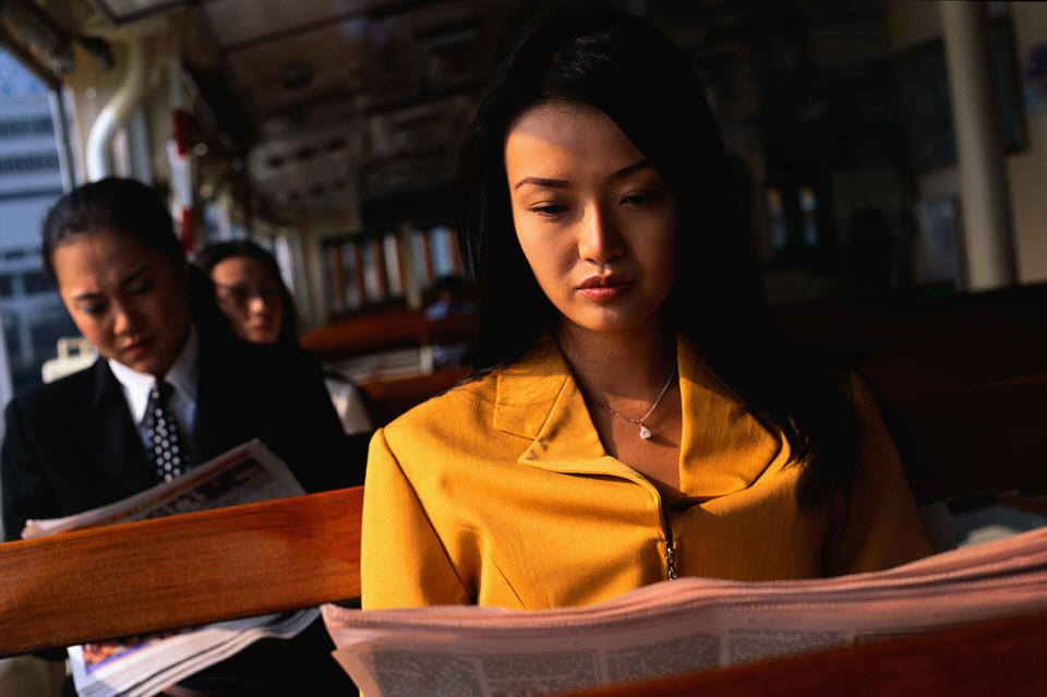 Women Reading a News Paper